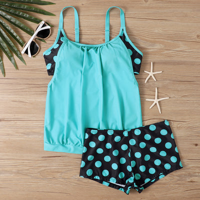 Women's two-piece swimsuit with a turquoise tankini top and black boxer bottoms with turquoise polka dots. - Image 34