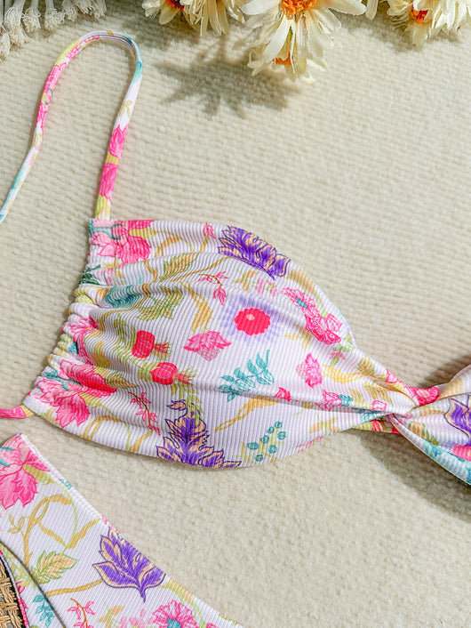 White ribbed two-piece bikini with colorful floral print, featuring a bandeau top and high-cut bottom. - Image 24