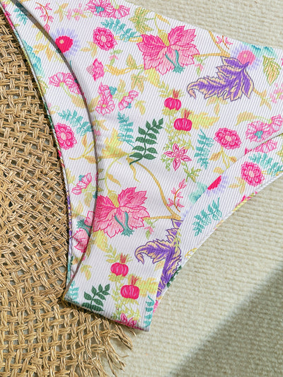 White ribbed two-piece bikini with colorful floral print, featuring a bandeau top and high-cut bottom. - Image 28