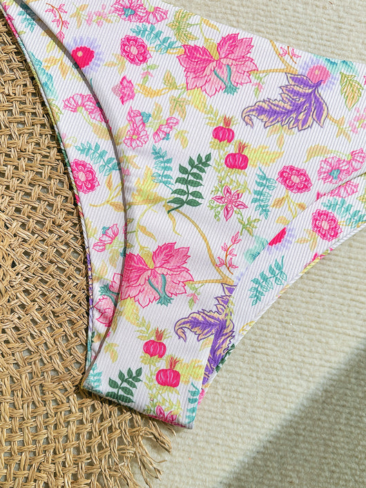 White ribbed two-piece bikini with colorful floral print, featuring a bandeau top and high-cut bottom. - Image 28