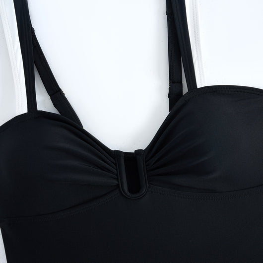 White one-piece women's swimsuit with black side panels and straps, featuring a ruched bust and U-shaped detail. - Image 34