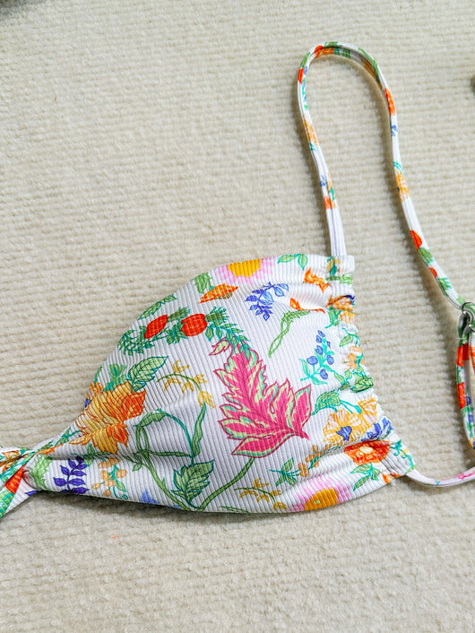 White ribbed two-piece bikini with colorful floral print, featuring a bandeau top and high-cut bottom. - Image 26