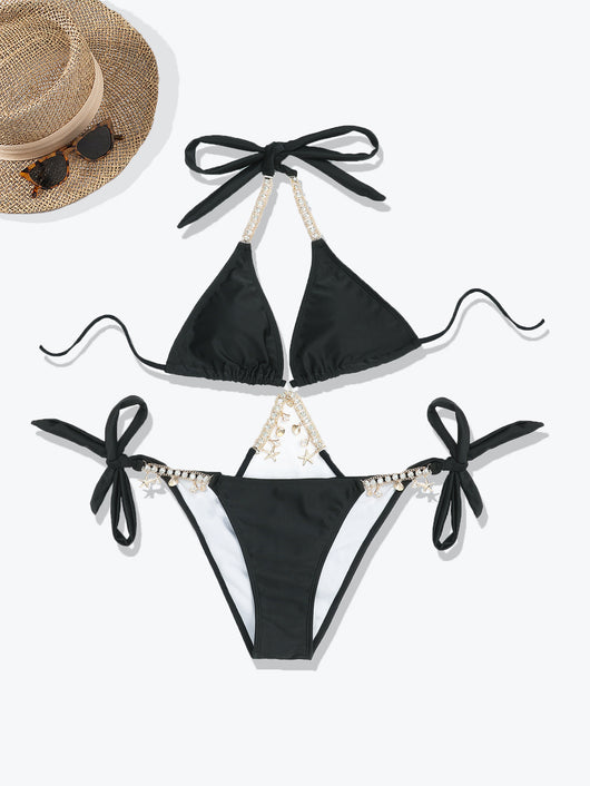 Olive green split bikini with gold chain and charm embellishments, worn with a sheer white cover-up on a beach. - Image 20
