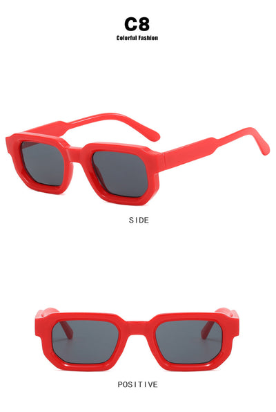 Black square-frame sunglasses with thick, angular frames and dark blue lenses, shown on a white background. - Image 36