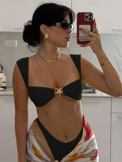 Bright yellow bikini with wide shoulder straps and a gold metal decoration on the top, worn by a woman. - Image 14