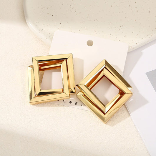 Aretes Rombo Minimalista en Metal - Efecto Rostro Más Delgado - Image 13
