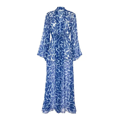 Woman in black and white floral print one-piece swimsuit with matching long-sleeved kimono cover-up and white belt. - Image 12