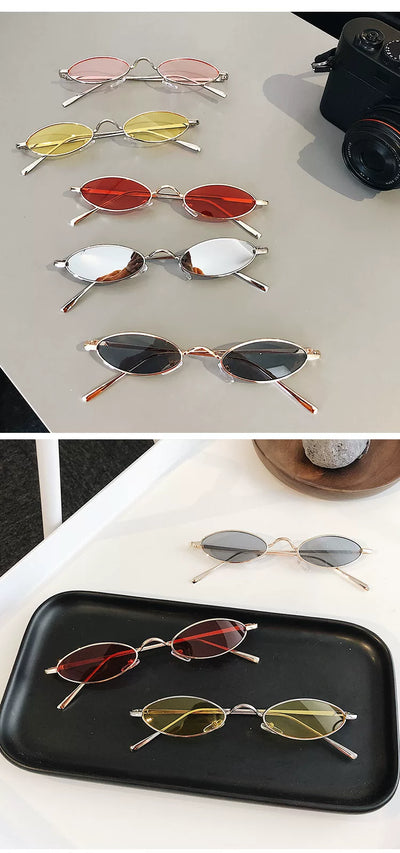 Silver-framed oval sunglasses with dark lenses reflecting a warm-toned object, displayed on a white tray. - Image 10
