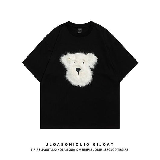 Black short sleeve t-shirt with a fluffy white puppy face embroidery, featuring a small gold barrette on its ear. - Image 12