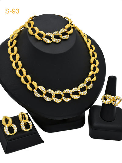 Women's Saudi bridal four-piece gold-colored jewelry set with floral and leaf designs, featuring a necklace, bracelet, earrings, and ring. - Image 9