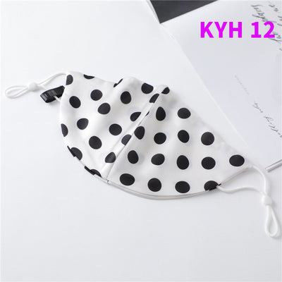 White silk face mask with light blue floral pattern and adjustable ear loops for women's sun protection. - Image 13