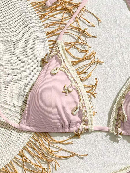 Light pink ribbed halterneck bikini with triangle cups and tie-side bottom, adorned with shell and starfish charms. - Image 12