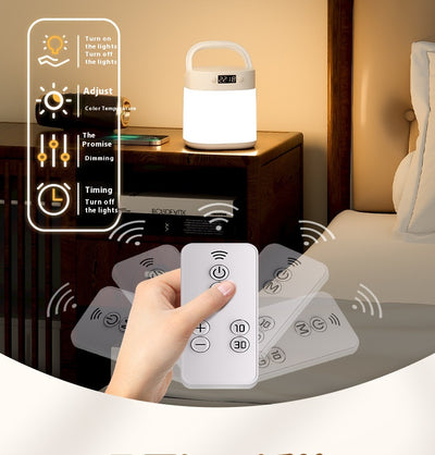 White rechargeable LED table lamp with a digital clock display and a light gray carrying handle. - Image 19