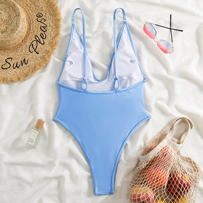 Dark brown one-piece swimsuit with a deep V-neckline and thin adjustable straps, styled with a straw hat and sunglasses. - Image 10
