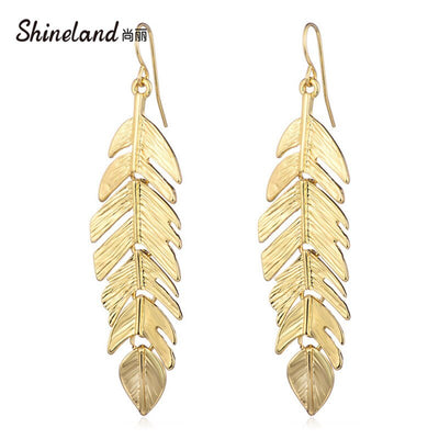 Aretes Largos de Borla y Hoja - Diseño Europeo Minimalista - Image 4