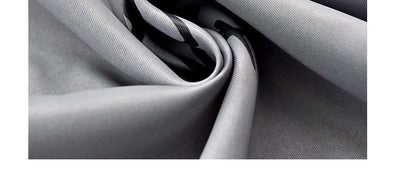 Brown thickened shading curtain with an electric carving floral texture, partially drawn in a bedroom setting. - Image 9