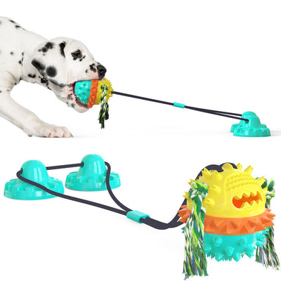 Red, white, and blue textured dog chew toy with rope tassels and a blue suction cup base, shown with a Dalmatian puppy playing. - Image 8
