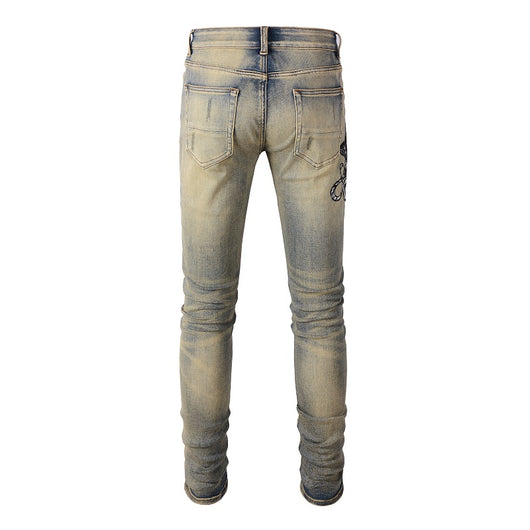 Jeans Slim Fit Desgastados con Bordado de Serpiente de Tres Cabezas y Parches de Cuero - Image 3