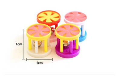 Colorful plastic cat bell roller toy with yellow and orange wheel, white and yellow rods, and a white end cap. - Image 7