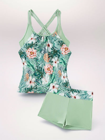 Women's light green high-waisted tankini swimsuit with tropical floral print top and solid swim shorts. - Image 13