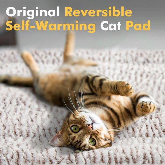 Light gray fluffy pet sleeping mat with a black and white French Bulldog sitting on it. Measures 27.5x18.5 inches.