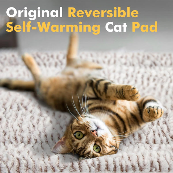 Light gray fluffy pet sleeping mat with a black and white French Bulldog sitting on it. Measures 27.5x18.5 inches.
