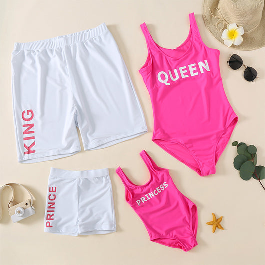 Rose pink one-piece swimsuit with 'QUEEN' printed in white on the front, featuring a scoop neck and tank straps. - Image 3