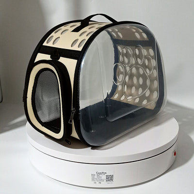 Gray and black pet carrier with a clear bubble window featuring paw prints and a mesh side for ventilation. - Image 24
