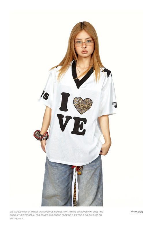Playera Mujer Cuello V Leopardo con Splicing - Manga Corta - Image 17