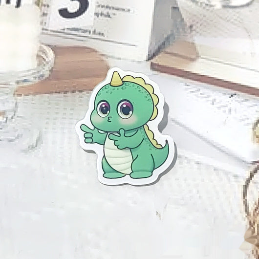 Cute green cartoon dinosaur acrylic badge brooch with a shy expression and small spikes on its back. - Image 7
