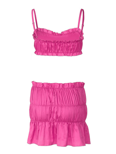 Fuchsia ruched tube top and matching pleated mini skirt set on a woman, perfect for summer. - Image 15