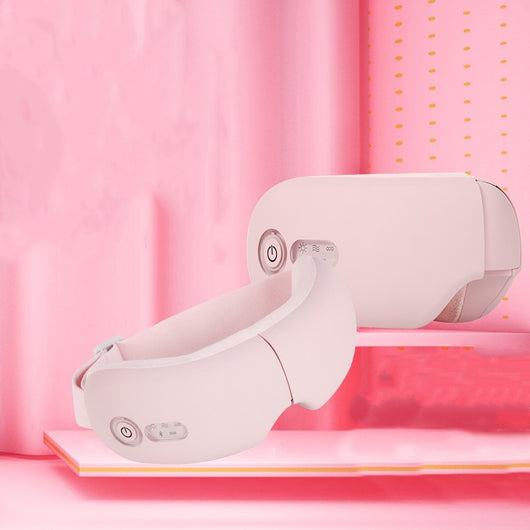 White Bluetooth Smart Eye Massager with vibration, hot compress, and airbag massage, featuring a foldable design. - Image 15