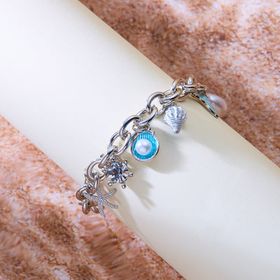 Collar y Pulsera de Perlas con Colgantes de Concha y Estrella de Mar - Image 11