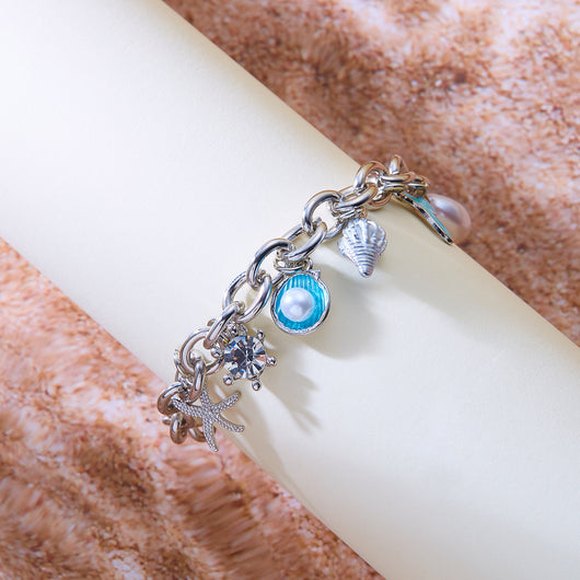 Collar y Pulsera de Perlas con Colgantes de Concha y Estrella de Mar - Image 11