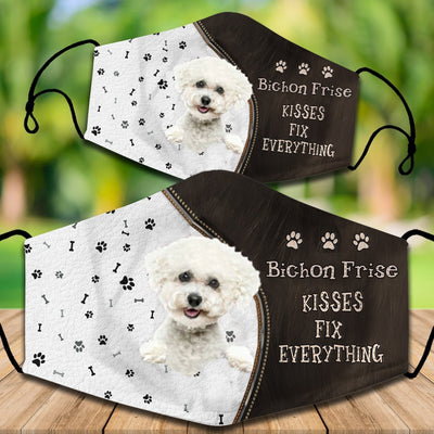 Two cotton face masks with a Bichon Frise dog, paw prints, and bones on a white and brown background. Text reads "Bichon Frise KISSES FIX EVERYTHING." - Image 23