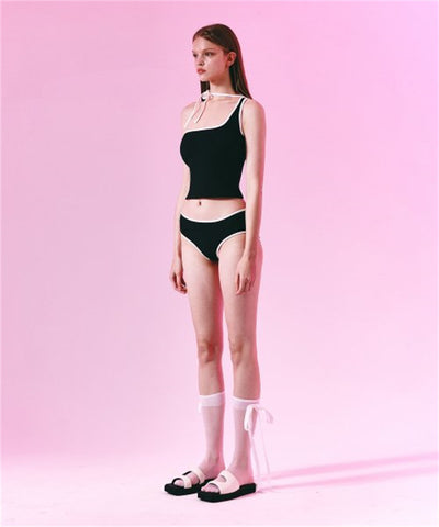 Women's light purple one-shoulder swimsuit with dark red contrast trim, lying on a striped blanket on green grass. - Image 14