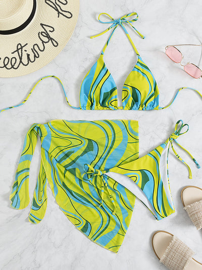 Ladies three-piece bikini set with a halter top, tie-side bottoms, and matching sarong in a green, blue, and yellow swirl pattern. - Image 12