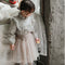 Blusa Infantil Elegante con Cuello de Madera y Flores