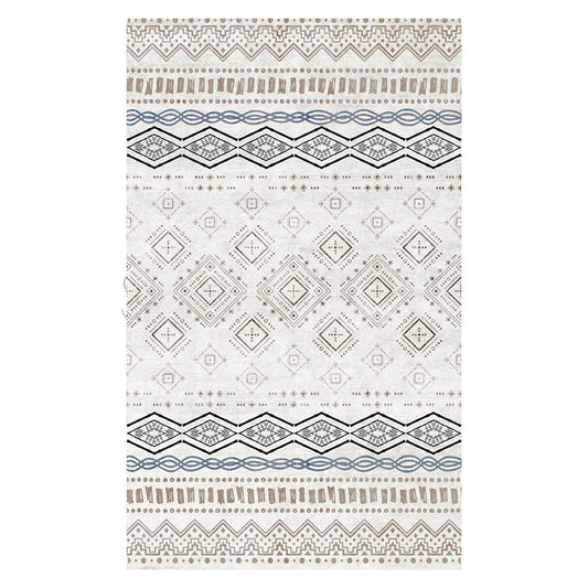 Rectangular area rug with white background and horizontal stripes of black, teal, and yellow tribal patterns.