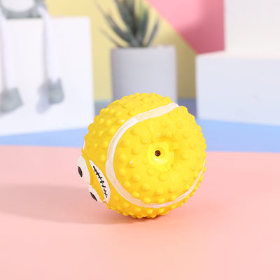Yellow textured latex pet ball with a cartoon face, designed as a sounding dog toy for teeth cleaning. - Image 8