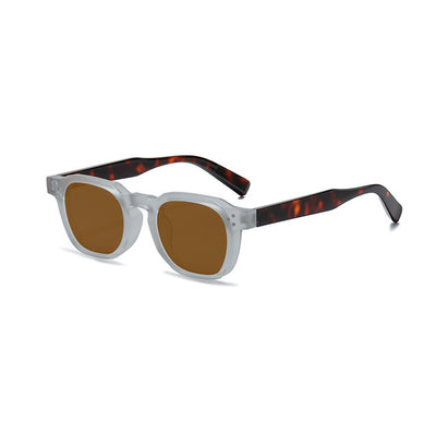 Black square-frame sunglasses with bright yellow lenses and small silver studs on the front corners. - Image 14