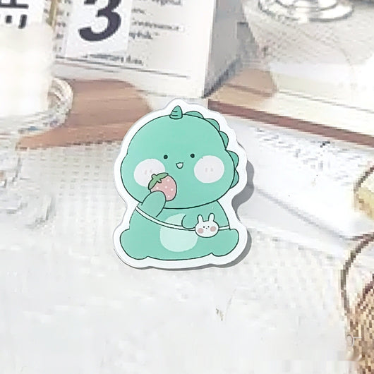 Cute green cartoon dinosaur acrylic badge brooch with a shy expression and small spikes on its back. - Image 15