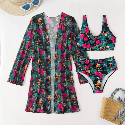 Multicolor tropical print three-piece swimsuit set with high-waisted bikini and sheer mesh cover-up on a beach. - Image 34