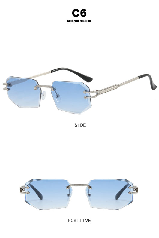Rimless octagonal clear lens glasses with silver-toned metal temples and black ear tips, featuring decorative accents. - Image 19