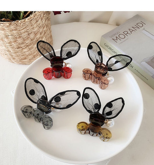 Black sheer polka dot rabbit ears hair claw clip with a faux pearl and gold-toned metal accents. - Image 18