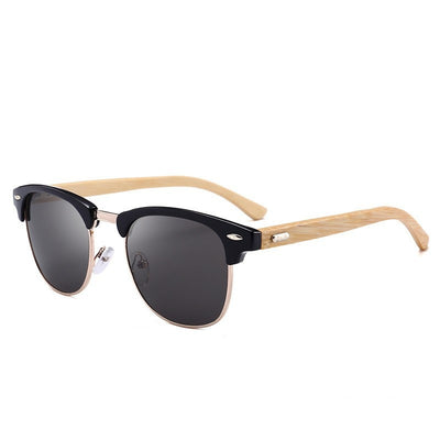 Clubmaster sunglasses with black upper frames, gold-tone metal lower rims, blue mirrored lenses, and light wood-look temples. - Image 16