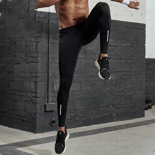 Black men's fitness pants with a tight fit, elastic waistband, and reflective strips on the lower legs. - Image 6