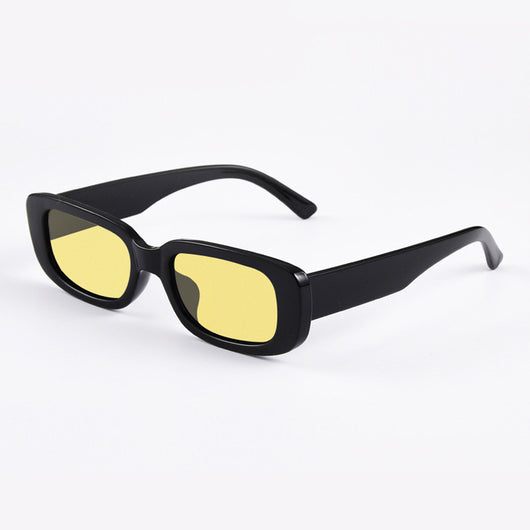Rectangular tortoiseshell sunglasses with a small frame and dark gray lenses, angled on a white background. - Image 26