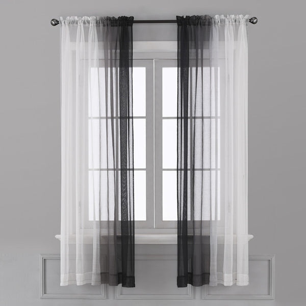 Pink and white gradient sheer rod pocket curtain panels hung on a black rod in front of a window. - Image 3