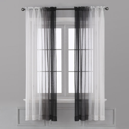 Pink and white gradient sheer rod pocket curtain panels hung on a black rod in front of a window. - Image 3